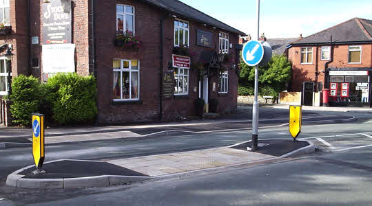 The rebuilt and redemolished and rebuilt traffic island, 2010/09/08